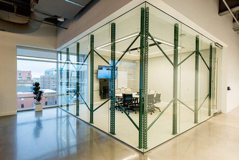 Conference room with glass walls and metal framing