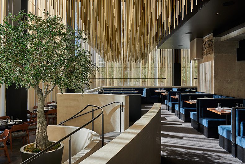 Sushi restaurant dining room with built-in booths, wall partitions and intricate ceiling system installation