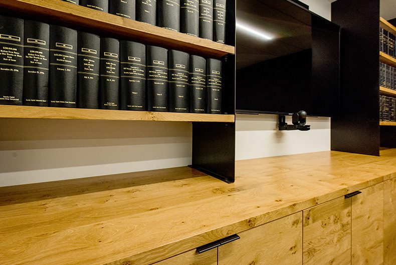 Conference room shelving and wood cabinetry