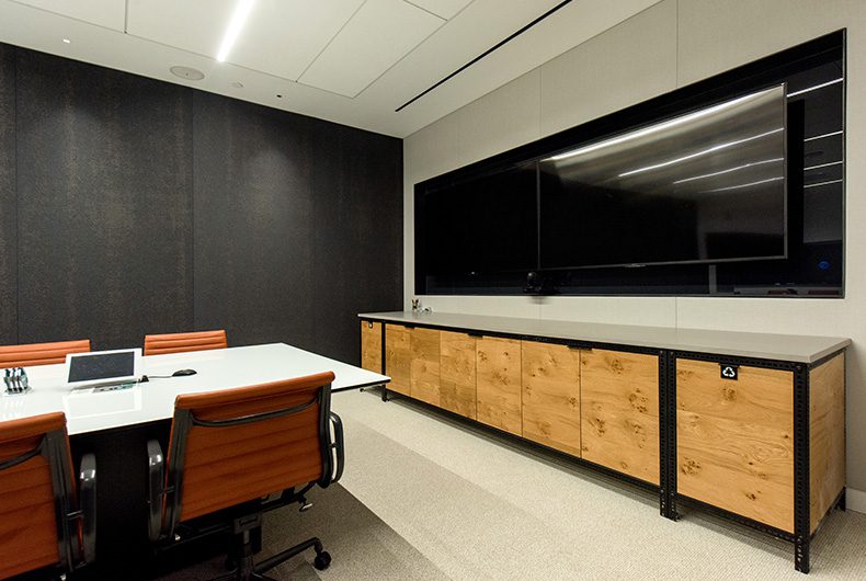 Conference room electronics center and wood cabinets