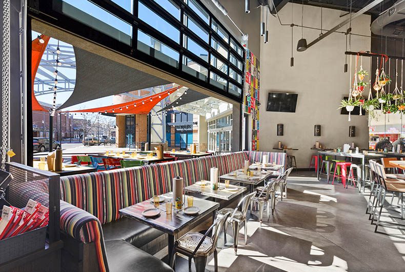 Banquette seating for colorful restaurant dining area